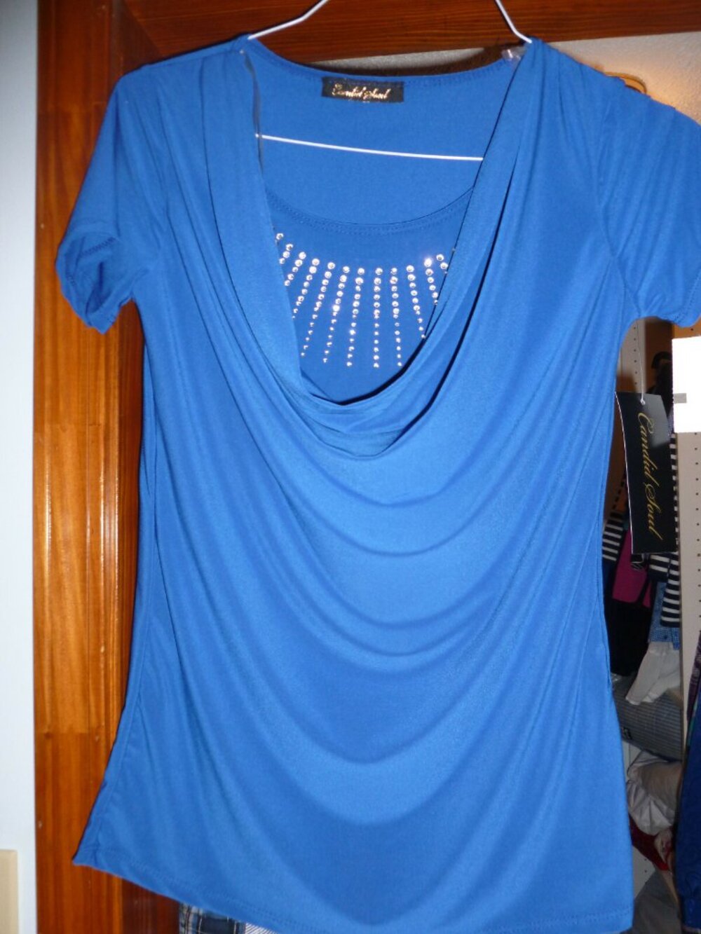 NWT Stunning royal blue drape neck top with decorative accents size small